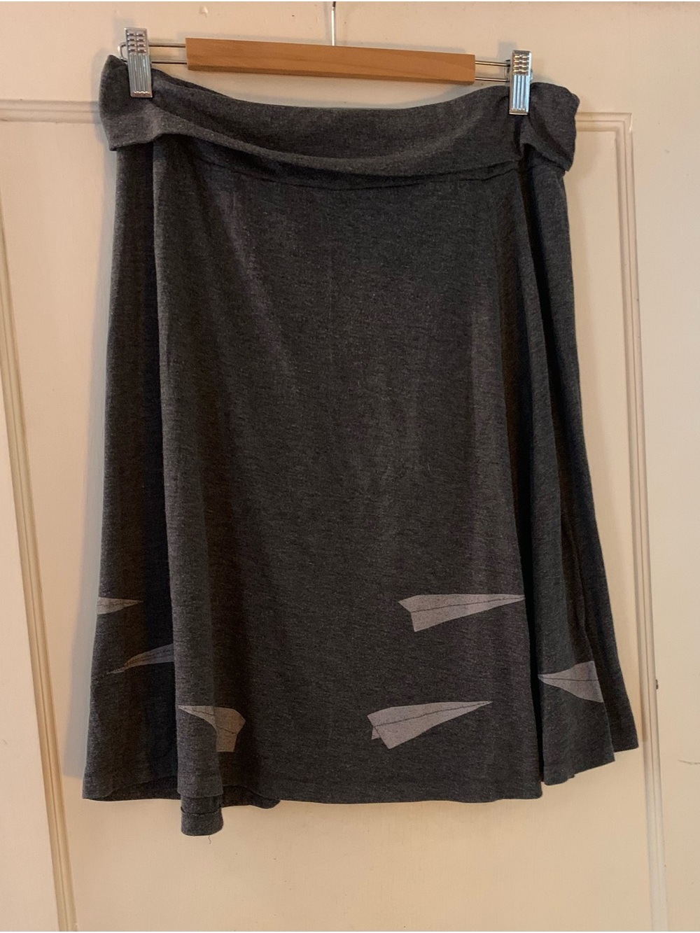Women's Jersey Gray A-Line Skirt with roll waist and paper airplane print.
